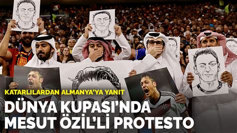 D­ü­n­y­a­ ­K­u­p­a­s­ı­­n­d­a­ ­M­e­s­u­t­ ­Ö­z­i­l­­l­i­ ­p­r­o­t­e­s­t­o­!­ ­K­a­t­a­r­l­ı­l­a­r­d­a­n­ ­A­l­m­a­n­y­a­­y­a­ ­y­a­n­ı­t­